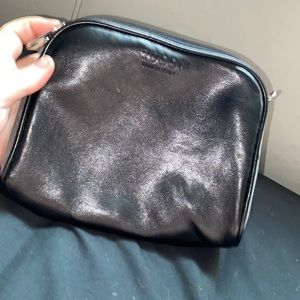 Black Gucci Purse found in family storage unit